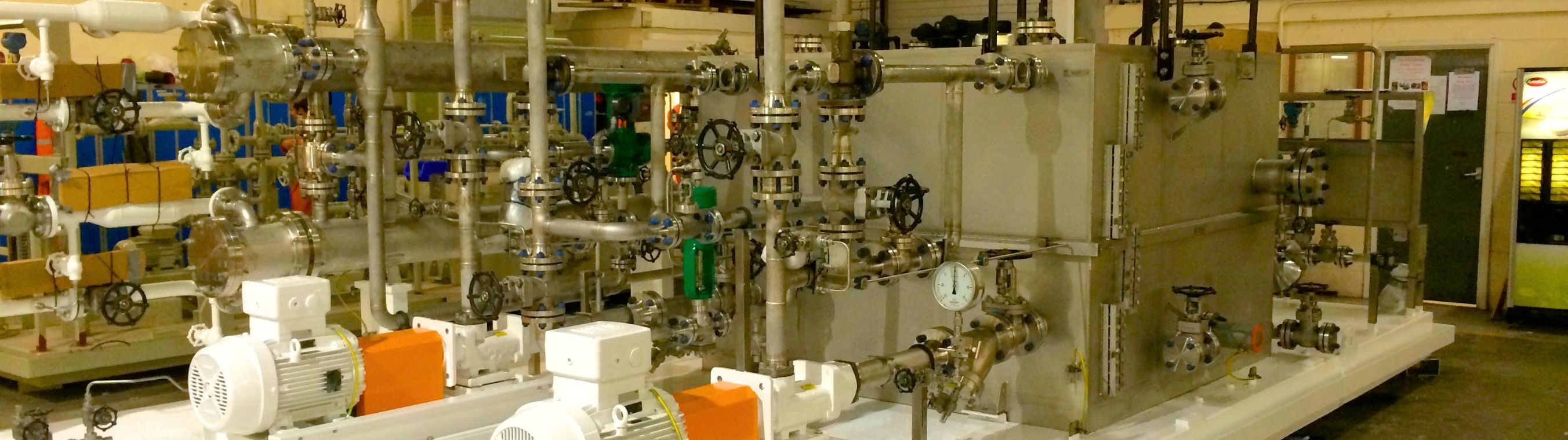 Skid-mounted process equipment on a manufacturing floor